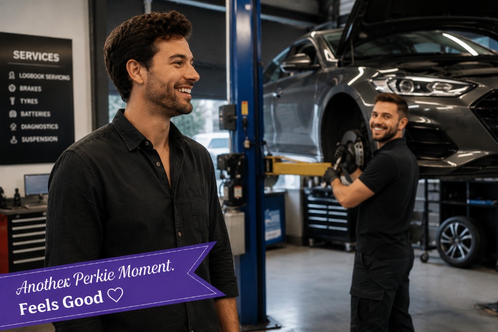 Happy customer at a motor mechanic workshop during an off-peak Perkie Moment booking